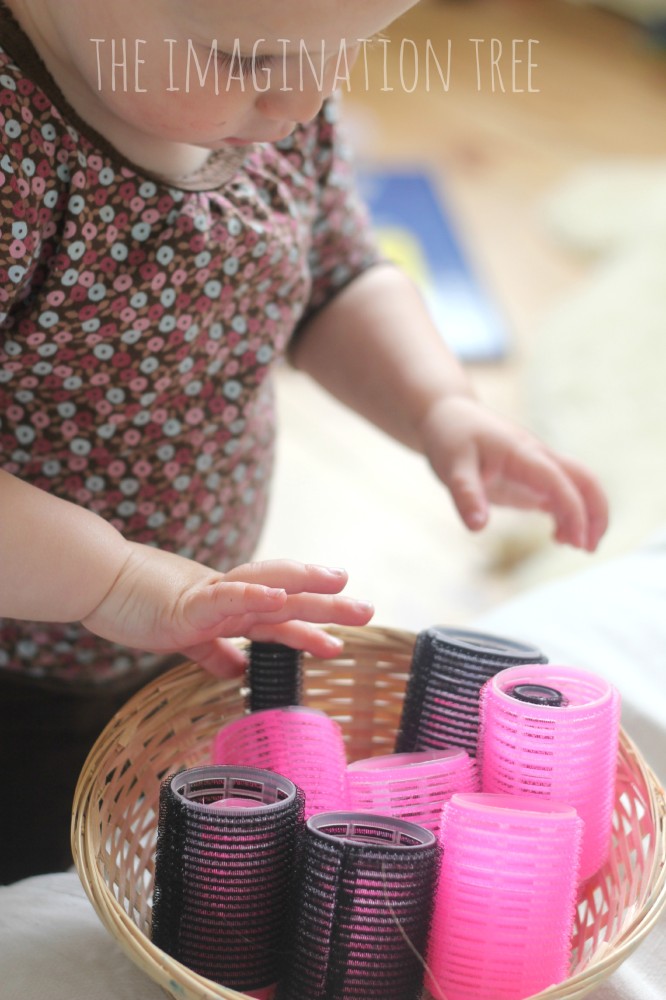 Baby-play-activity-with-hair-rollers